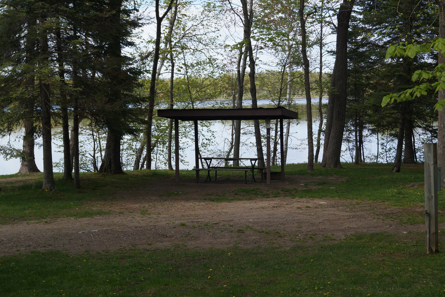 Site 6 is right on the lakes edge with shade